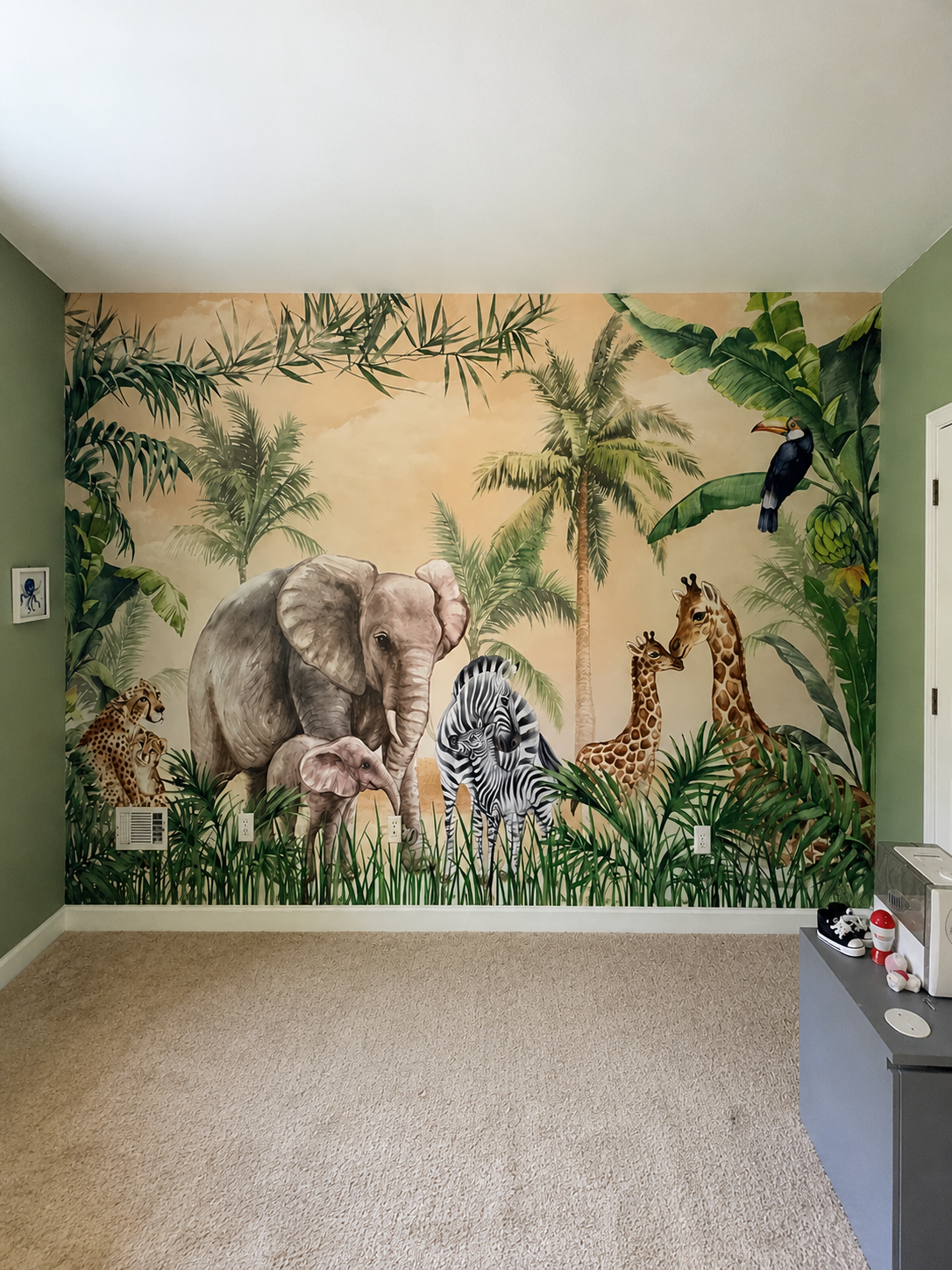 Jungle animals mural wallpaper installed in a child's bedroom in Sandy Springs GA